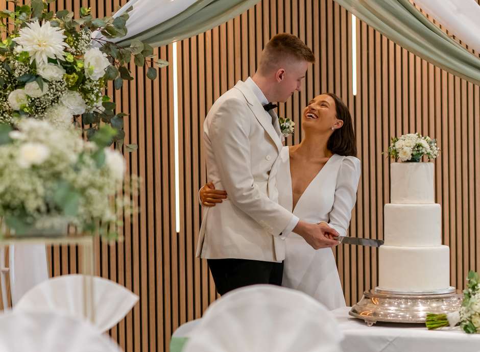 Bride and Groom cutting cake at The Barnstaple Hotel