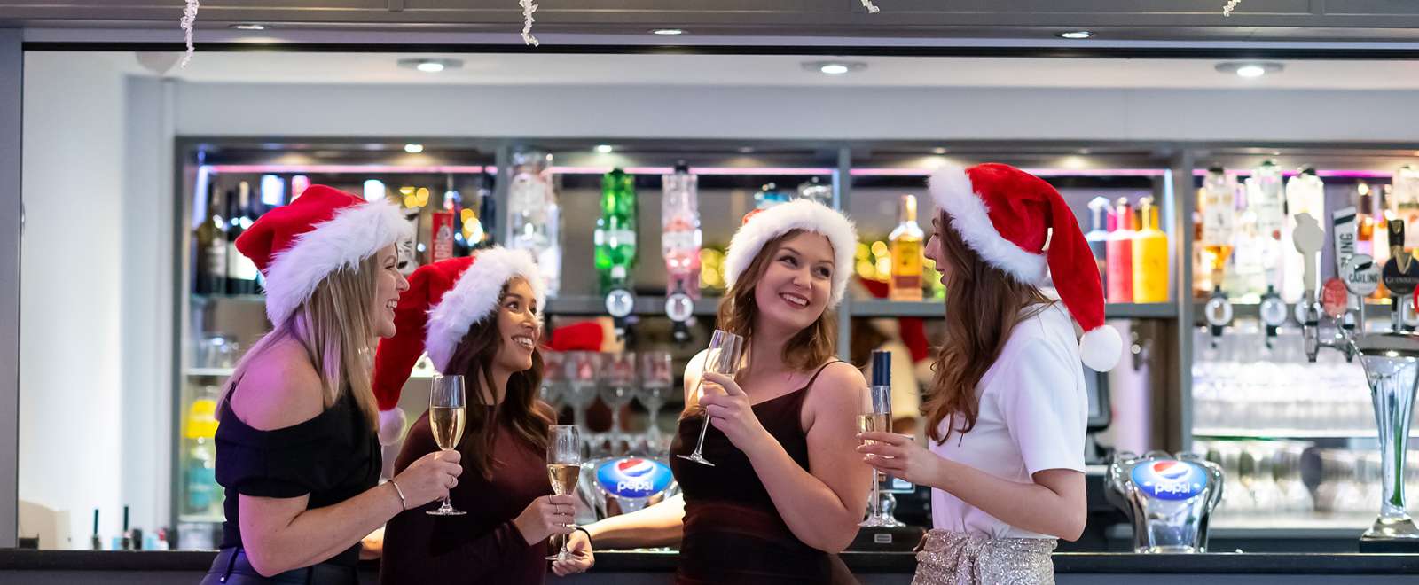 Woman drinking at bar