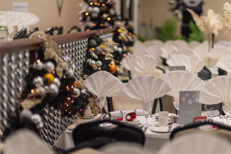 Tables set for Christmas party 