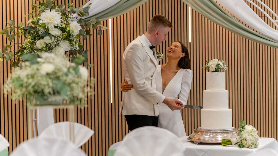 Bride and Groom cutting cake at The Barnstaple Hotel