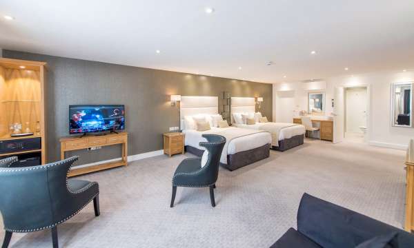 Barnstaple Hotel Taw Suite Accommodation Bed Television and Seating