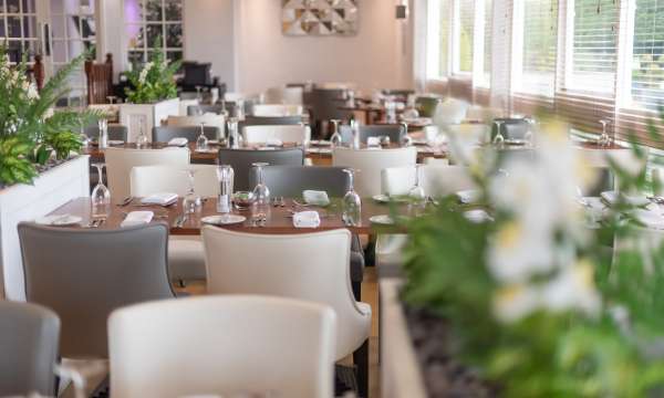 restaurant with cream & grey chairs