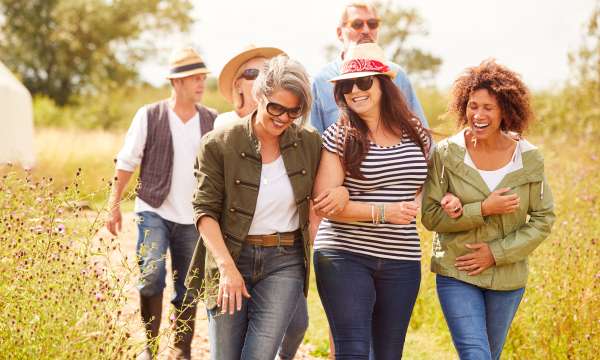 group of middle-aged people in field