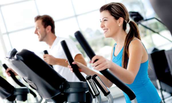 woman and man in a gym