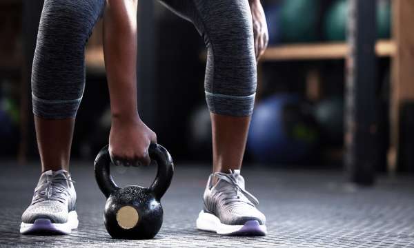 Woman holding a dumbell