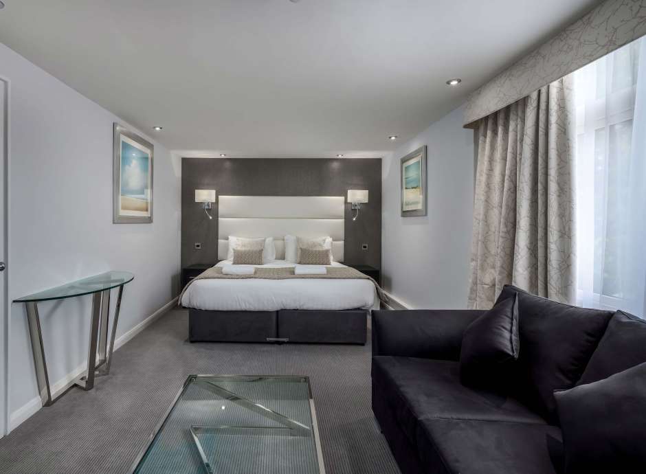 Barnstaple Hotel Deluxe Room Accommodation Bed and Seating Area