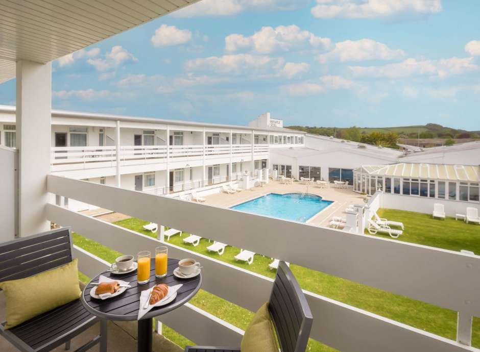 Barnstaple Hotel Pool View Room Balcony with Pastries and Coffee