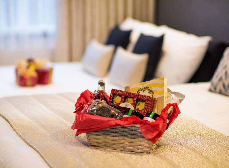 Barnstaple Hotel Christmas Hamper on Bed in Room