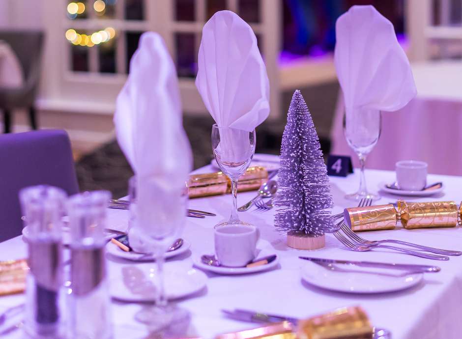 Tables set for Christmas party 