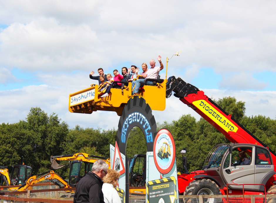 People riding the skyshuttle at Diggerland