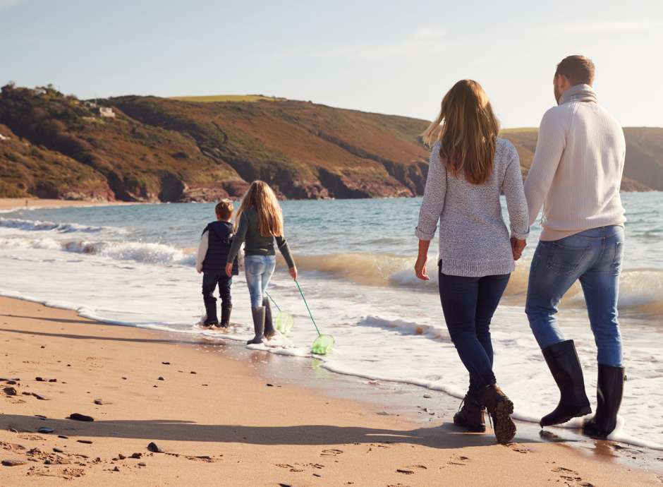 Family walking on the beach