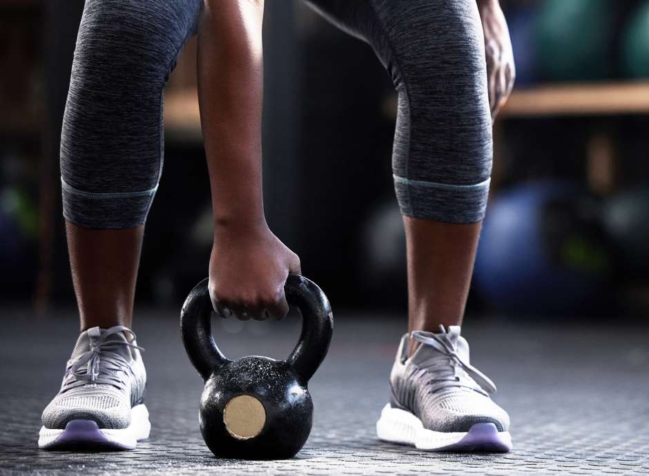 Woman holding a dumbell