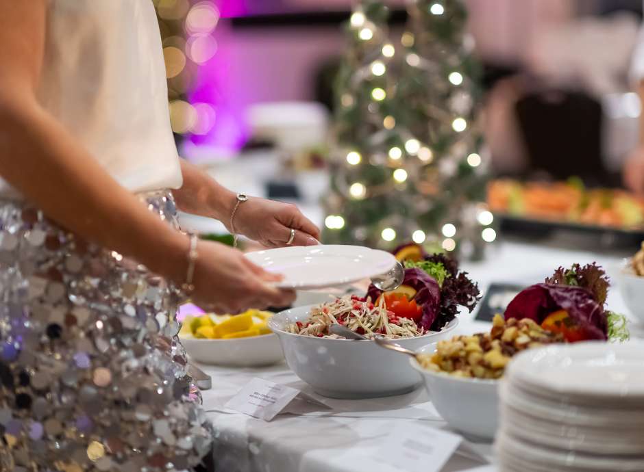 Woman dishing up food