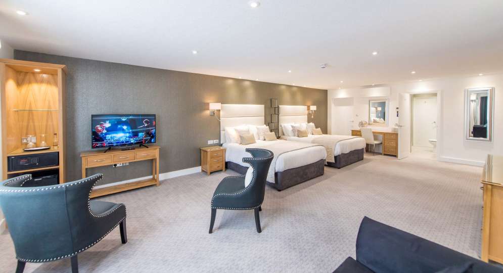 Barnstaple Hotel Taw Suite Accommodation Bed Television and Seating