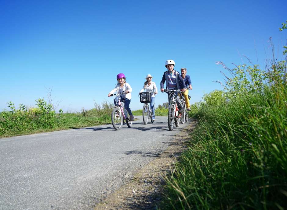 family of four cycling